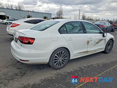 Trzecie zdjęcie samochodu z tyłu: 2017 VOLKSWAGEN JETTA SPORT VIN:3VWD17AJ0HM395589 - miniatura