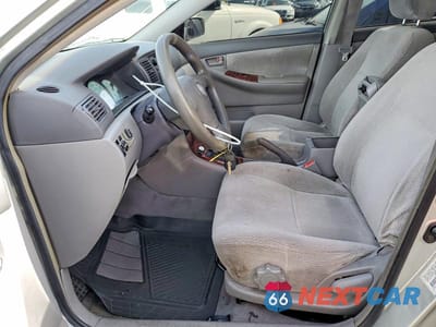 Zdjęcie 7 z 12 samochodu: 2003 TOYOTA COROLLA LE VIN:JTDBR32E030021668 - miniatura