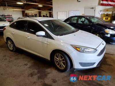 Czwarte zdjęcie samochodu z boku: 2015 FORD FOCUS SE VIN:1FADP3F22FL323244 - miniatura