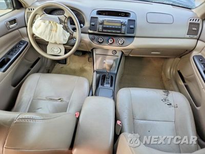 Zdjęcie 8 z 11 samochodu: 2005 TOYOTA CAMRY LE VIN:4T1BE30K25U053596 - miniatura