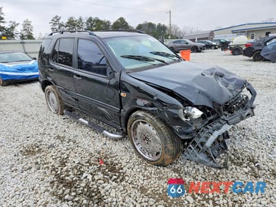 Czwarte zdjęcie samochodu z boku: 2001 MERCEDES-BENZ ML 320 VIN:4JGAB54EX1A262326 - miniatura