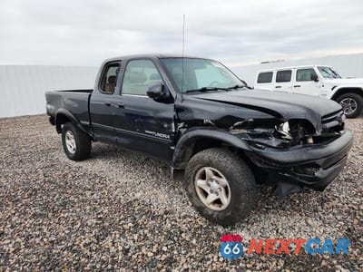 Czwarte zdjęcie samochodu z boku: 2002 TOYOTA TUNDRA LIMITED V8 VIN:5TBBT48182S262667 - miniatura