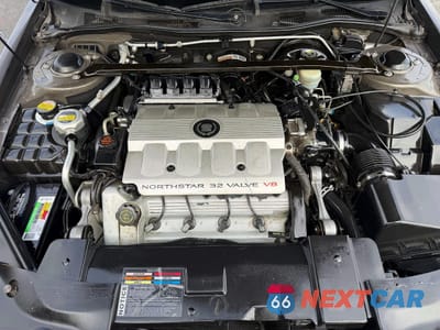 Zdjęcie 7 z 14 samochodu: 1999 CADILLAC ELDORADO VIN:1G6EL12Y8XU600597 - miniatura