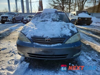 Piąte zdjęcie samochodu w środku: 2003 TOYOTA CAMRY LE VIN:4T1BE30K73U672322 - miniatura