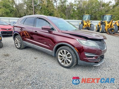 Czwarte zdjęcie samochodu z boku: 2018 LINCOLN MKC SELECT VIN:5LMCJ2C9XJUL30344 - miniatura