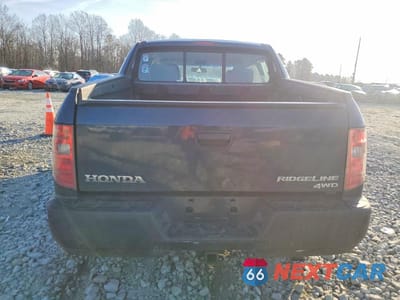 Zdjęcie 6 z 11 samochodu: 2011 HONDA RIDGELINE RT VIN:5FPYK1F25BB003161 - miniatura