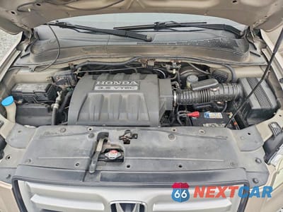 Zdjęcie 12 z 12 samochodu: 2006 HONDA PILOT EX VIN:2HKYF18556H508032 - miniatura