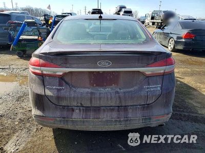 Zdjęcie 6 z 11 samochodu: 2017 FORD FUSION TITANIUM HEV VIN:3FA6P0RU3HR394512 - miniatura