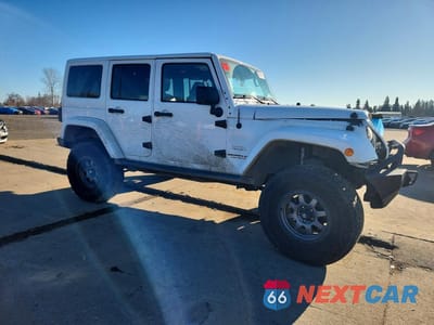 Czwarte zdjęcie samochodu z boku: 2012 JEEP WRANGLER UNLIMITED SAHARA VIN:1C4BJWEG6CL186516 - miniatura