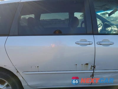 Zdjęcie 11 z 13 samochodu: 2005 TOYOTA SIENNA VIN:5TDBA22C15S053190 - miniatura