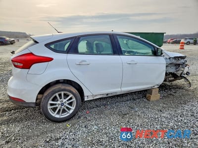 Trzecie zdjęcie samochodu z tyłu: 2018 FORD FOCUS SE VIN:1FADP3K29JL329525 - miniatura