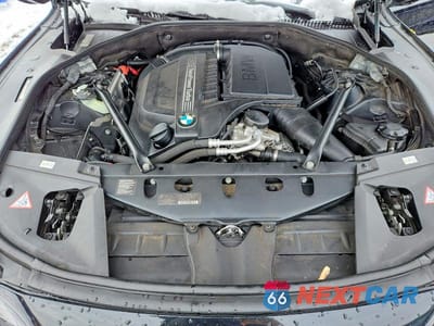 Zdjęcie 11 z 11 samochodu: 2013 BMW 740 I VIN:WBAYA6C5XDC994927 - miniatura