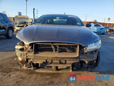 Piąte zdjęcie samochodu w środku: 2017 LINCOLN MKZ PREMIERE VIN:3LN6L5B91HR630210 - miniatura