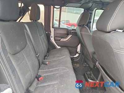 Zdjęcie 10 z 13 samochodu: 2015 JEEP WRANGLER UNLIMITED SAHARA VIN:1C4BJWEG9FL723271 - miniatura