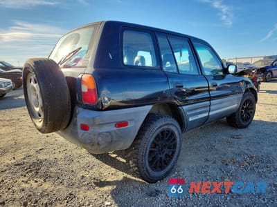 Trzecie zdjęcie samochodu z tyłu: 1997 TOYOTA RAV4 BASE VIN:JT3HP10V0V7047547 - miniatura