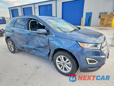 Czwarte zdjęcie samochodu z boku: 2018 FORD EDGE SEL VIN:2FMPK3J88JBB25130 - miniatura