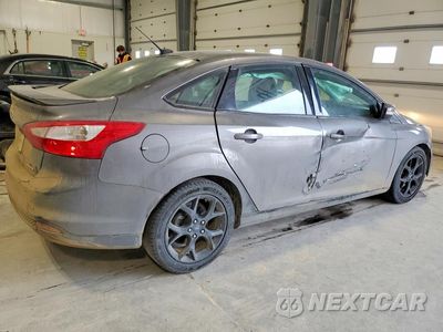 Trzecie zdjęcie samochodu z tyłu: 2013 FORD FOCUS SE VIN:1FADP3F20DL371614 - miniatura