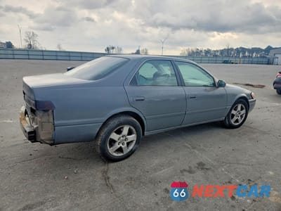 Trzecie zdjęcie samochodu z tyłu: 1999 TOYOTA CAMRY LE V6 VIN:JT2BF22K0X0155894 - miniatura