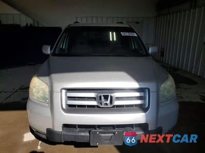 Piąte zdjęcie samochodu w środku: 2006 HONDA PILOT EX VIN:2HKYF18456H559831 - miniatura