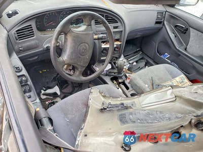 Zdjęcie 8 z 13 samochodu: 2002 HYUNDAI ELANTRA GLS VIN:KMHDN45D12U351559 - miniatura