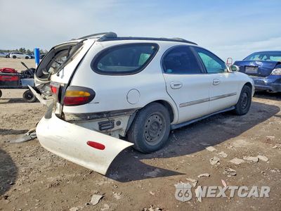 Trzecie zdjęcie samochodu z tyłu: 1997 FORD TAURUS GL VIN:1FALP57U0VA196205 - miniatura