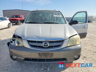Zdjęcie 12 z 13 samochodu: 2003 MAZDA TRIBUTE VIN:4F2CZ06103KM32258 - miniatura