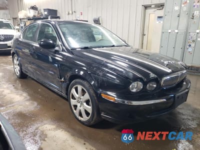 Czwarte zdjęcie samochodu z boku: 2005 JAGUAR X-TYPE 3.0 VIN:SAJWA51AX5WE47276 - miniatura