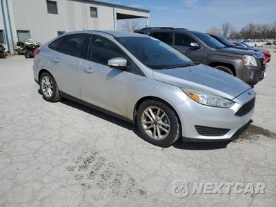 Czwarte zdjęcie samochodu z boku: 2016 FORD FOCUS SE VIN:1FADP3F23GL291289 - miniatura