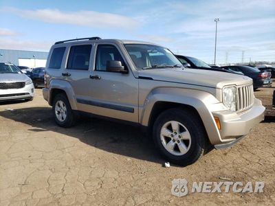 Czwarte zdjęcie samochodu z boku: 2010 JEEP LIBERTY SPORT VIN:1J4PN2GK1AW109448 - miniatura