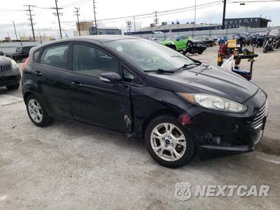 Czwarte zdjęcie samochodu z boku: 2016 FORD FIESTA SE VIN:3FADP4EJ6GM157048 - miniatura