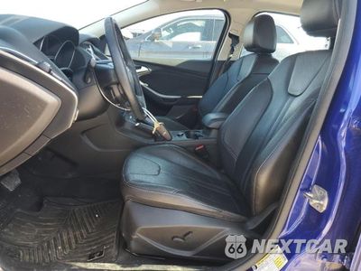 Zdjęcie 7 z 12 samochodu: 2014 FORD FOCUS TITANIUM VIN:1FADP3J23EL216760 - miniatura