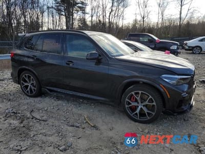 Czwarte zdjęcie samochodu z boku: 2021 BMW X5 M50I VIN:5UXJU4C05M9F51619 - miniatura