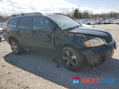 Czwarte zdjęcie samochodu z boku: 2011 MITSUBISHI ENDEAVOR SE VIN:4A4JN3ASXBE025347 - miniatura