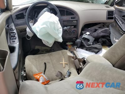 Zdjęcie 8 z 12 samochodu: 2003 HYUNDAI ELANTRA GLS VIN:KMHDN45D43U695078 - miniatura