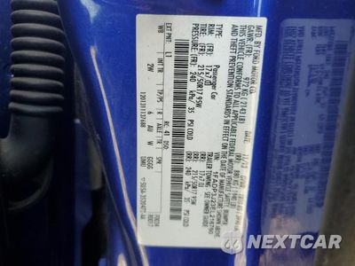 Zdjęcie 12 z 12 samochodu: 2014 FORD FOCUS TITANIUM VIN:1FADP3J23EL216760 - miniatura