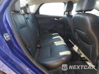Zdjęcie 10 z 12 samochodu: 2014 FORD FOCUS TITANIUM VIN:1FADP3J23EL216760 - miniatura