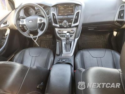 Zdjęcie 8 z 12 samochodu: 2014 FORD FOCUS TITANIUM VIN:1FADP3J23EL216760 - miniatura