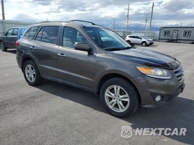 Czwarte zdjęcie samochodu z boku: 2012 HYUNDAI SANTA FE SE VIN:5XYZHDAG5CG143737 - miniatura