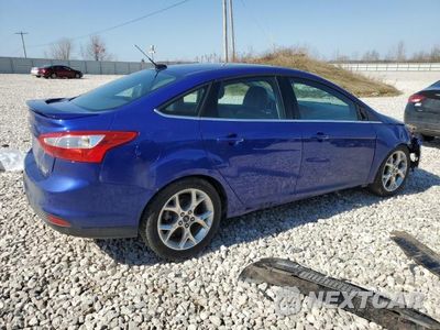 Trzecie zdjęcie samochodu z tyłu: 2014 FORD FOCUS TITANIUM VIN:1FADP3J23EL216760 - miniatura