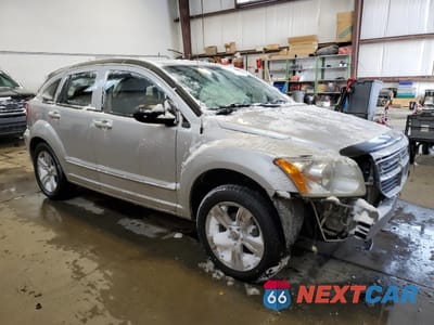 Czwarte zdjęcie samochodu z boku: 2010 DODGE CALIBER SXT VIN:1B3CB4HA4AD637254 - miniatura
