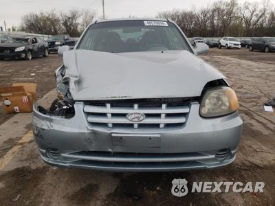 Piąte zdjęcie samochodu w środku: 2005 HYUNDAI ACCENT GS VIN:KMHCG35C45U340339 - miniatura