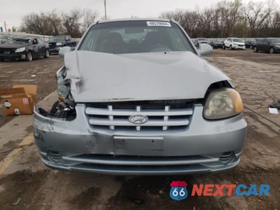 Piąte zdjęcie samochodu w środku: 2005 HYUNDAI ACCENT GS VIN:KMHCG35C45U340339 - miniatura