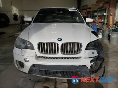Piąte zdjęcie samochodu w środku: 2010 BMW X5 XDRIVE48I VIN:5UXFE8C55AL311424 - miniatura