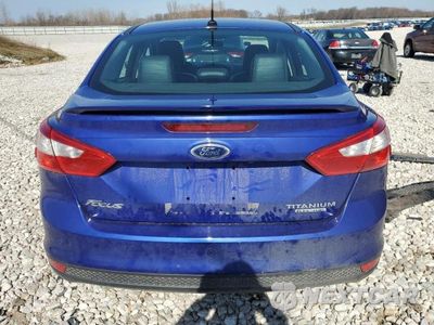 Zdjęcie 6 z 12 samochodu: 2014 FORD FOCUS TITANIUM VIN:1FADP3J23EL216760 - miniatura