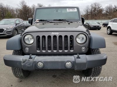 Piąte zdjęcie samochodu w środku: 2017 JEEP WRANGLER UNLIMITED SPORT VIN:1C4HJWDG4HL600783 - miniatura