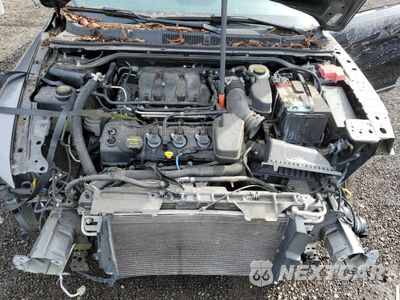 Zdjęcie 11 z 13 samochodu: 2013 FORD TAURUS SEL VIN:1FAHP2H8XDG181163 - miniatura