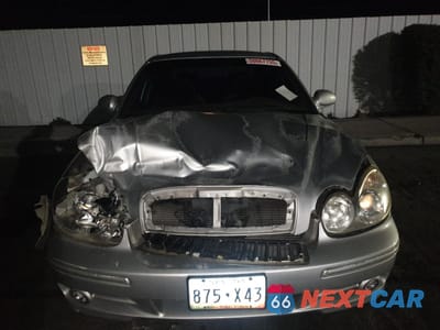 Piąte zdjęcie samochodu w środku: 2003 HYUNDAI SONATA GL VIN:KMHWF25S63A761771 - miniatura