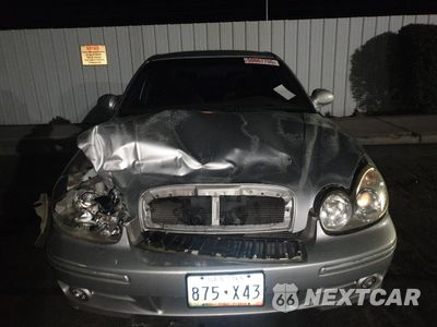 Piąte zdjęcie samochodu w środku: 2003 HYUNDAI SONATA GL VIN:KMHWF25S63A761771 - miniatura
