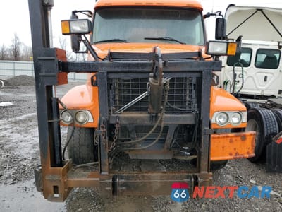 Zdjęcie 11 z 12 samochodu: 2006 VOLVO VHD DUMP TRUCK VIN:4V5KC9GG36N414294 - miniatura