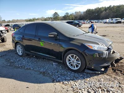 Czwarte zdjęcie samochodu z boku: 2016 FORD FOCUS SE VIN:1FADP3F22GL355161 - miniatura